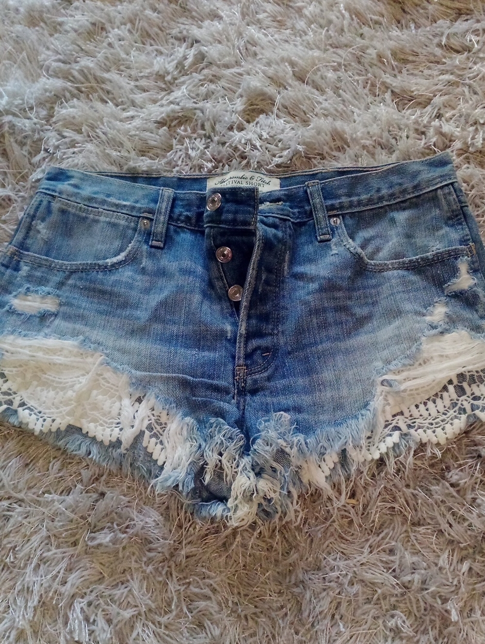 Abercrombie & Fitch Distressed Blue Denim Shorts with White Lace Trim